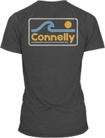 Back view of the Surf Tee in dark gray featuring a retro graphic with a blue wave, yellow sun, and "Connelly" text.