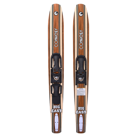 Pair of Connelly Big Easy combo skis with bindings, showcasing a retro woodgrain aesthetic.