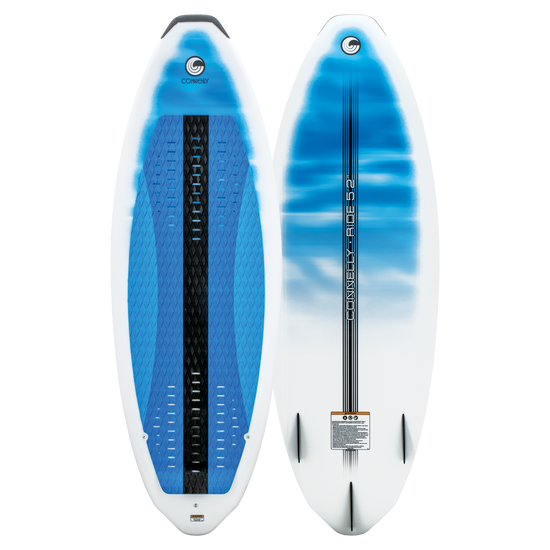 Ride wakesurf board showing both top and base, with a white and blue gradient design, black traction pad, and quad fins.