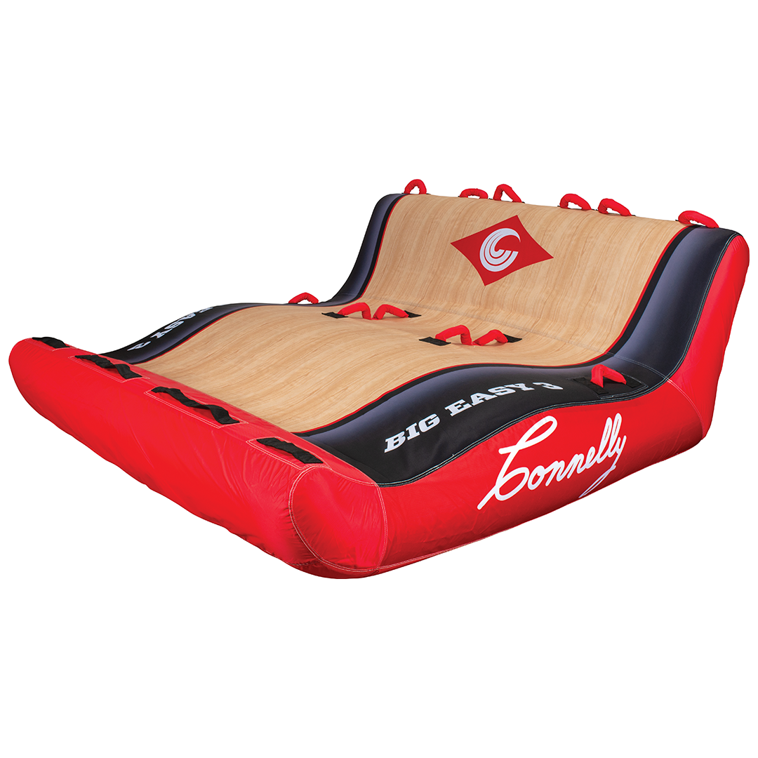 Big Easy 3 towable tube in red, black, and woodgrain design featuring multiple grab handles and a contoured seat shape.